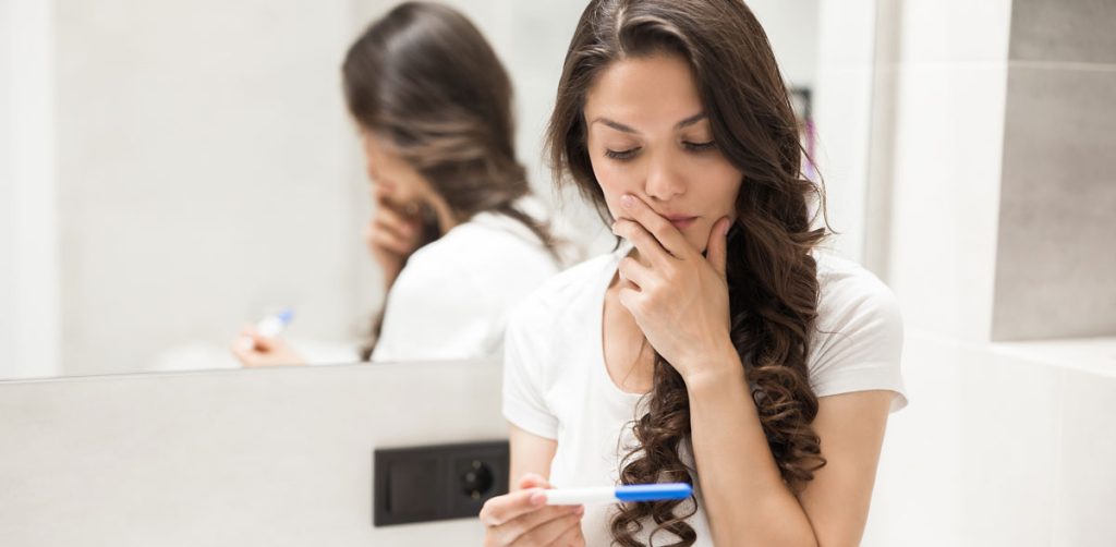 woman considering abortion pill online