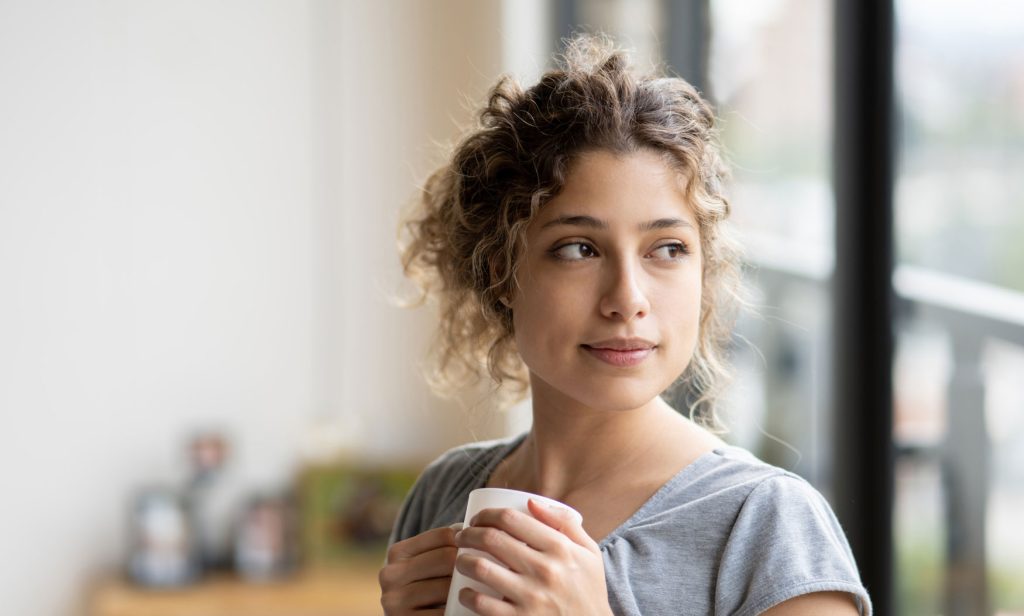 Woman at home in Aurora, IL thinking about Plan B and abortion
