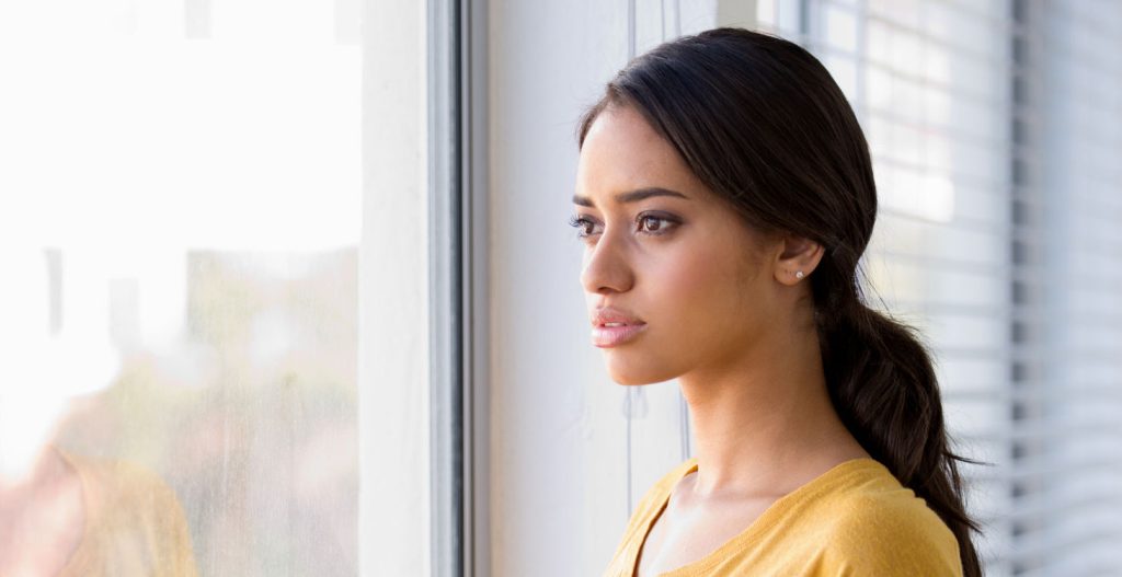 Woman wondering if it is safe to buy the abortion pill online