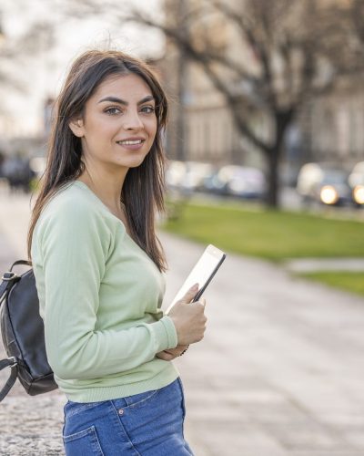 Young woman walking to Waterleaf Women's Center for her appointment to learn about the abortion pill.